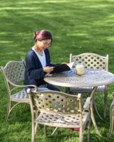 Scale Shot of Deluxe “Aether” Outdoor Four Seater Garden Table & Chair Set in Smooth Champagne
