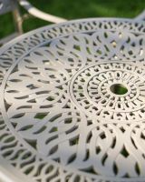 Close-Up of Circular Table for Deluxe “Aether” Outdoor Four Seater Garden Table & Chair Set in Smooth Champagne