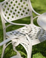 Close-Up of Chair for Deluxe “Aether” Outdoor Four Seater Garden Table & Chair Set in White Close-Up of Chair for Deluxe “Aether” Outdoor Four Seater Garden Table & Chair Set in White