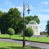 Deluxe Antique Copper Ornate Cast Iron Swan Neck Lamp Post In Garden Setting Deluxe Antique Copper Ornate Cast Iron Swan Neck Lamp Post In Garden Setting
