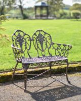 Deluxe Two-Seater Cast Aluminium "Rosebud" Garden Bench in Situ Deluxe Two-Seater Cast Aluminium "Rosebud" Garden Bench in Situ