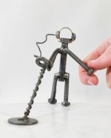 Scale image of metal detectorist scrap metal art sculpture