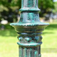 Detailing on Ornate Green Lamp Post Column