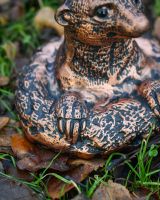 Close Up Details Of The Copper Peeking Meerkat Garden Sculpture