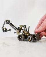 Scale of scrap metal art sculpture Scale of scrap metal art sculpture