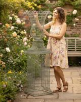 Digital Illustration of the "Millar House" Wire Planter in Situ in a Flowery Garden