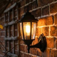 Digital Illustration of the Traditional "Pointed" Black Aluminium Victorian Wall Lantern Illuminated at Night Digital Illustration of the Traditional "Pointed" Black Aluminium Victorian Wall Lantern Illuminated at Night