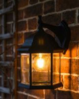 Digital Illustration of the Traditional Black Hexagonal Victorian Top-Fix Wall Lantern Illuminated at Night Digital Illustration of the Traditional Black Hexagonal Victorian Top-Fix Wall Lantern Illuminated at Night