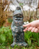Digital illustation of ‘Podge’ the Small Garden Gnome in Cast Aluminium - Verdigris with hand in shot for scale