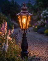 Digital Illustration 105cm Copper Concordia Patio or Driveway Lighting Positioned on a Flowery Gravel Driveway and Lit up at Night Digital Illustration 105cm Copper Concordia Patio or Driveway Lighting Positioned on a Flowery Gravel Driveway and Lit up at Night