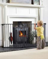Digital illustration of "BabyPro" Midnight Black Three Panel Baby Safe Fire Guard with toddler stood in front of fireguard Digital illustration of "BabyPro" Midnight Black Three Panel Baby Safe Fire Guard with toddler stood in front of fireguard