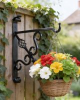 Digital illustration of "Cupid"s Arrow" Blacksmith Iron Hanging Bracket mounted on garden fence