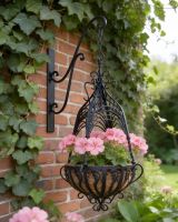Digital illustration of "Loredale Manor" Black Ornate Hanging Basket mounted on brick wall