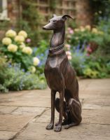 Digital Illustration of "Albus" the Sitting Greyhound Cast Aluminium Garden Sculpture on a Flowery Garden Patio