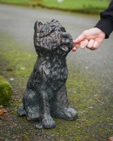 Digital illustration of ‘Baxter’ the Yorkshire Terrier Garden Sculpture in Cast Aluminium - Verdigris with hand in shot for scale