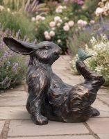 Digital Illustration of Bird Sitting on Rabbit Garden Sculpture on a Garden Path Digital Illustration of Bird Sitting on Rabbit Garden Sculpture on a Garden Path