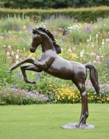 Digital illustration of Black & Gold Rearing Horse Sculpture side view of sculpture