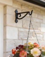 Digital illustration of Black Scroll Iron Hanging Basket Bracket on a brick wall
