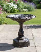 Digital illustration of Brushed Gold "Plumis" Bird Bath on sunny patio garden