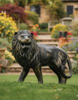 Digital Illustration of Brushed Gold Lion Sculpture Looking Left in Front of a Stepped Patio