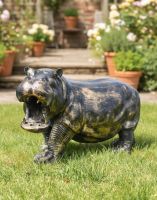 Digital Illustration of Deluxe Cast Aluminium Freestanding Wild Hippo Garden Sculpture in Antique Gold on a Garden Lawn