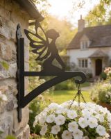 Digital illustration of Fairy Hanging Iron Basket Bracket mounted on cottage building