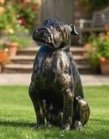 Digital Illustration of Freestanding Cast Aluminium Sitting Bulldog Garden Sculpture on a Garden Lawn with a Bench in Background