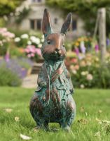 Digital illustration of a verdigris Mr Rabbit Sculpture in a cottage garden