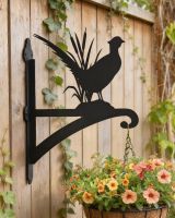 Digital Illustration of the Pheasant Iron Hanging Basket Bracket Mounted on Light Brown Garden Fence