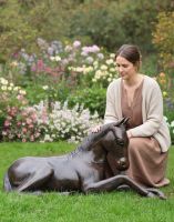 Digital illustration of Resting Foal Garden Horse Sculpture with lady in shot for scale
