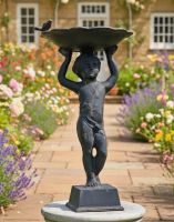 Digital Illustration of Rustic Black Cherub Bird Bath as a Garden Focal Point on a Pathway