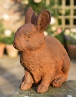 Digital illustration of Rustic Cast Iron "Nibbles" Rabbit Sculpture close up view in garden