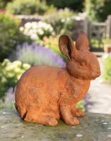 Digital illustration of Rustic Cast Iron "Nibbles" Rabbit Sculpture side view in cottage garden