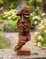 Digital illustration of Rustic Cast Iron Abstract "Listener" Sculpture in a garden