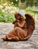 Digital illustration of Rustic Cast Iron Angel in Thought Sculpture Digital illustration of Rustic Cast Iron Angel in Thought Sculpture