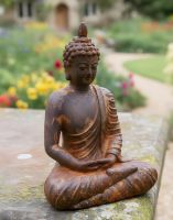Digital illustration of Rustic Cast Iron Meditating Buddha Sculpture angled view in garden
