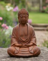 Digital illustration of Rustic Cast Iron Sitting Buddha Sculpture in sunny cottage garden