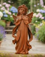 Digital illustration of Rustic Cast Iron Winged Praying Angel Sculpture in flowery garden