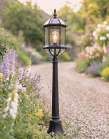 Digital Illustration of the 1.25m "Hemingway" Traditional Birdcage Pillar Light Positioned on a Flowery Gravel Driveway Entrance