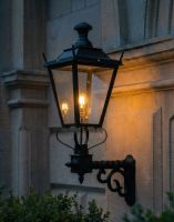 Digital Illustration of the 102 x 54cm Black Dorchester Wall Lantern on a Royale Bracket Lit up at Night