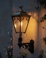 Digital Illustration of the 102 x 54cm Brass Gothic Wall Lantern on an Ornate Bracket Lit up at Night