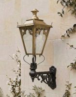 Digital Illustration of the 102 x 54cm Brass Gothic Wall Lantern on an Ornate Bracket Mounted on a Sandstone Brick Garden Wall