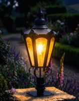 Digital Illustration of the 102cm Black Hexagonal Pillar Light and Lantern Set Mounted on a Stone Garden Pillar Whilst Lit up at Night