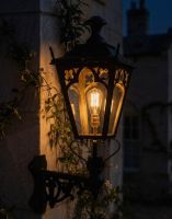 Digital Illustration of the 102cm x 54cm Black Gothic Wall Lantern on Corner Bracket Lit up at Night 