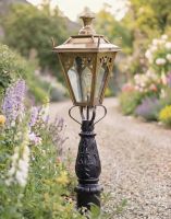 Digital Illustration of the 105cm Antique Brass Gothic Design Driveway and Patio Lighting Placed Next to a Flowery Gravel Entrance