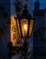 Digital Illustration of the 115 x 53cm Black Hexagonal Wall Lantern on Corner Bracket Lit up at Night Digital Illustration of the 115 x 53cm Black Hexagonal Wall Lantern on Corner Bracket Lit up at Night