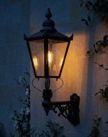 Digital Illustration of the 115 x 65cm Victorian Wall Lantern on an Ornate Bracket Lit up at Night
