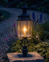 Digital Illustration of the 117cm Belgravia Pillar Light and Lantern Set Mounted on a Stone Garden Wall Pillar Whilst Lit up at Night