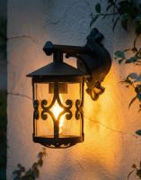 Digital Illustration of the "Ebberton" Scrolled Design Traditional Top Fix Wall Lantern Lit up at Night