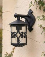 Digital Illustration of the "Ebberton" Scrolled Design Traditional Top Fix Wall Lantern Mounted on a Cream Coloured Garden Wall